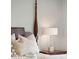 Close up of pillows and a nightstand with lamp in this bedroom at 1568 E Ashley Ave, Folly Beach, SC 29439