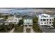 Charming two-story home featuring a porch, complemented by waterfront views, and a welcoming atmosphere at 1568 E Ashley Ave, Folly Beach, SC 29439