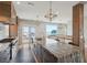 Modern kitchen boasting a large island with seating, stainless appliances, and balcony access with ocean views at 1568 E Ashley Ave, Folly Beach, SC 29439