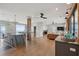 Spacious open-concept living area flows between the modern kitchen and comfortable seating area with water views at 1568 E Ashley Ave, Folly Beach, SC 29439