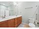 Bathroom featuring a double sink vanity, large mirror, and tiled floor at 1578 Stanwick Dr, Johns Island, SC 29455