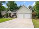 Charming home with a two-car garage, well-manicured lawn, and attractive landscaping adding curb appeal at 1578 Stanwick Dr, Johns Island, SC 29455