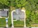 High aerial view of a home that shows roof condition, yard size, and general lot layout at 1593 Teague St, Charleston, SC 29407