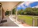 Inviting covered porch featuring brick accents and an outdoor view at 1593 Teague St, Charleston, SC 29407