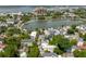 Stunning aerial view of the community highlighting the neighborhood homes, the lake and the park at 16 Trumbo St, Charleston, SC 29401