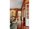 Dining room featuring wood-paneled walls, built-in bookshelves, and chandelier, ideal for elegant dining at 16 Trumbo St, Charleston, SC 29401
