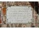 Cornerstone laid 1850, marble marker in brick wall, a testament to historic construction at 16 Trumbo St, Charleston, SC 29401
