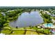 Aerial view of a pond in a neighborhood with a walkway, a dog park, a pool and a community building at 1723 Bolden Dr, Mount Pleasant, SC 29466