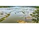 Scenic aerial view of river with marsh grass in foreground at 1723 Bolden Dr, Mount Pleasant, SC 29466