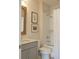 Bright bathroom with a gray vanity, stylish mirror, and a shower with subway tile at 1723 Bolden Dr, Mount Pleasant, SC 29466