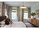 Serene bedroom featuring natural light, a dresser, and soft textiles for a calm and inviting atmosphere at 1723 Bolden Dr, Mount Pleasant, SC 29466