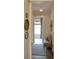 Hallway with neutral decor, including a bench, carpet runner, and decorative wall accents at 1723 Bolden Dr, Mount Pleasant, SC 29466