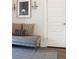 Hallway with bench seating, artwork and sconce lighting provides a functional and stylish entry or transitional space at 1723 Bolden Dr, Mount Pleasant, SC 29466