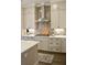 Close up view of the kitchen's range and hood, set against a sleek backsplash and white cabinetry at 1723 Bolden Dr, Mount Pleasant, SC 29466