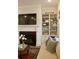 Inviting living room with fireplace, built-in shelving, and comfortable seating area, perfect for relaxation and entertaining at 1723 Bolden Dr, Mount Pleasant, SC 29466