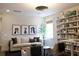 Well-lit living room featuring comfortable seating, built-in bookshelves, and stylish decor at 1723 Bolden Dr, Mount Pleasant, SC 29466