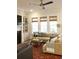 Bright living room with a fireplace, sofa, chairs, and a ceiling fan at 1723 Bolden Dr, Mount Pleasant, SC 29466