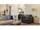 Cozy living space with a plush armchair, stylish lamp, and elegant decor creating a welcoming atmosphere at 1723 Bolden Dr, Mount Pleasant, SC 29466