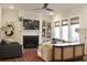 Comfortable living room with a fireplace, built-in shelving, ample seating, and natural light from the windows at 1723 Bolden Dr, Mount Pleasant, SC 29466