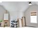 Bright studio space featuring an artist's easel and rolling cart for storage at 1723 Bolden Dr, Mount Pleasant, SC 29466