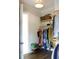 Bright walk-in closet with custom shelving, racks and a shoe rack, for optimal storage at 1723 Bolden Dr, Mount Pleasant, SC 29466