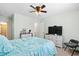 Bright bedroom with a ceiling fan, dresser, and television, bathed in natural light at 175 Basket Grass Ln, Summerville, SC 29486
