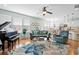 Inviting living room with hardwood floors, a floral rug, and a comfortable seating area at 175 Basket Grass Ln, Summerville, SC 29486