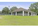 Exterior view of a community recreational building surrounded by a well-maintained lawn at 189 Fox Chase Dr, Goose Creek, SC 29445