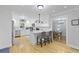 Stylish kitchen with stainless appliances, white cabinets, and center island open to the dining area, great for entertaining at 189 Fox Chase Dr, Goose Creek, SC 29445