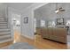 Open living room with hardwood floors and views of kitchen and dining room at 189 Fox Chase Dr, Goose Creek, SC 29445