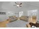 Bright living room featuring hardwood floors and a view of the dining area at 189 Fox Chase Dr, Goose Creek, SC 29445