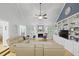 Spacious living room with hardwood floors, fireplace, and lots of natural light at 189 Fox Chase Dr, Goose Creek, SC 29445