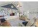 Cozy living room with built-in shelving, hardwood floors, and comfortable seating at 189 Fox Chase Dr, Goose Creek, SC 29445