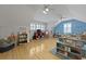 Large playroom with hardwood floors, ceiling fans, and lots of room to play at 189 Fox Chase Dr, Goose Creek, SC 29445