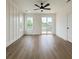 Bright bedroom with fan, windows, balcony access and smooth ceiling for a modern living style at 1906 Gumwood Blvd, North Charleston, SC 29406