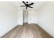 Bright bedroom with white walls, smooth ceilings, and adjacent closet offering a calm living style at 1906 Gumwood Blvd, North Charleston, SC 29406