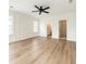 Bright bedroom with paneled accent wall, en suite bathroom, ceiling fan, and closet at 1906 Gumwood Blvd, North Charleston, SC 29406