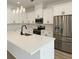 Spacious kitchen featuring stainless steel appliances, white cabinets, and a large center island at 1906 Gumwood Blvd, North Charleston, SC 29406