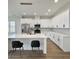 Bright kitchen featuring stainless steel appliances, white cabinets and quartz countertop on kitchen island at 1906 Gumwood Blvd, North Charleston, SC 29406