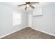 Bedroom featuring modern ceiling fan, closet, and window, enhancing comfort and natural light at 20 Stratton Dr, Charleston, SC 29420