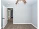 Bedroom with new floor, light gray walls, white baseboards and ceiling fan at 20 Stratton Dr, Charleston, SC 29420