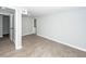 Spacious bedroom featuring light gray walls, new baseboards, and updated flooring at 20 Stratton Dr, Charleston, SC 29420