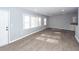 Bright living room featuring light gray walls, recessed lighting, and stylish, light-colored hardwood floors at 20 Stratton Dr, Charleston, SC 29420