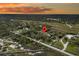 Aerial view showcases the home's location near marshland, trees, and a neighborhood at 200 Wappoo Rd, Charleston, SC 29407