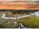 Breathtaking aerial view of waterfront property with private docks and stunning marshland at 200 Wappoo Rd, Charleston, SC 29407