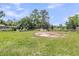 Expansive backyard with ample space and partial fencing at 200 Wappoo Rd, Charleston, SC 29407