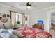Cozy bedroom featuring neutral paint and decor, ceiling fan and ensuite bathroom at 200 Wappoo Rd, Charleston, SC 29407