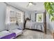 Bedroom featuring ceiling fan, lots of natural light, and colorful accents at 200 Wappoo Rd, Charleston, SC 29407