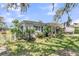 Charming home with a well-maintained lawn, white picket fence, and attractive exterior at 200 Wappoo Rd, Charleston, SC 29407