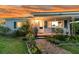Charming front porch with potted plants and decorative ironwork creates a welcoming entrance at 200 Wappoo Rd, Charleston, SC 29407